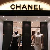 Mannequins pose outside of a Chanel outlet 