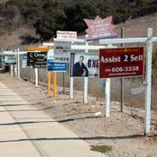 A row of for-sale signs 