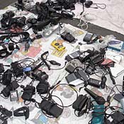 Chargers and power supplies on display in a booth at the electronics flea market in Cupertino, Calif.