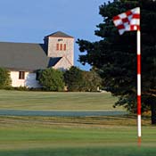 Golf course flag and Episcopal church 