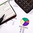 Checkbook, pie chart, calculator