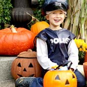 Boy dressed in Police outfit on Halloween 