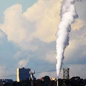 A smoke stack emitting fumes 