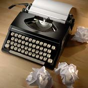 A typewriter and crumpled-up ideas 