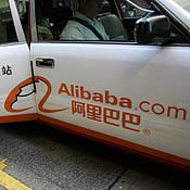 Alibaba,com logo on side of a taxi 