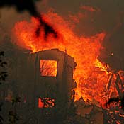 House burns during wildfire in Poway, Calif. 
