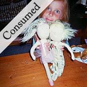 Daphne Mullen with a couple of the homemade dolls. 