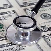 Stethoscope and $5 bills 