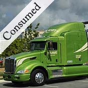 A green Wal-Mart sem-trailer truck 