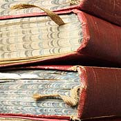 A stack of antique books 
