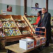 President Bush pushes cart at food bank 