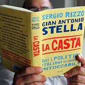 Man reads "The Caste" 