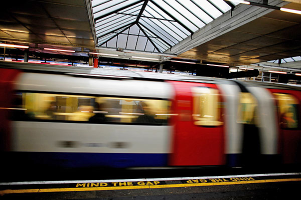 
                A London subway train moves from the platform at Finchley Road station in London.
                                    (Daniel Berehulak/Getty Images)
                                