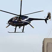 A Blackwater helicopter flies over Baghdad 