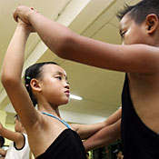 Chinese children practice Latin dance in Chengdu. 