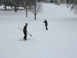 Cross-country skiers in St. Paul, Minn., take advantage of the season's first snowfall.
