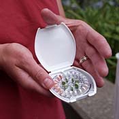 Woman holding contraceptives 