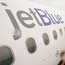 The side of a JetBlue airplane