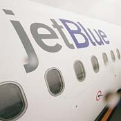 The side of a JetBlue airplane 