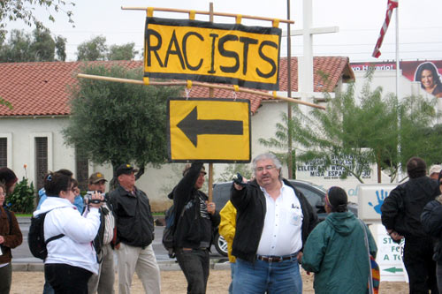 
                    About 200 people gathered at the intersection of 35th Street and Thomas Road on the East side of Phoenix.
                                            (Marin Davies)
                                        