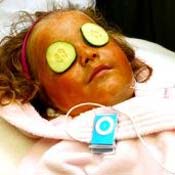 Girl with cucumbers on her eyes 
