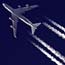 A passenger jet leaves an emission trail behind