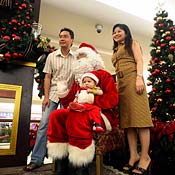 Family getting their picture taken with Santa 