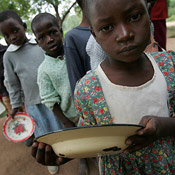 Children wait for food at a Zimbabwe school 