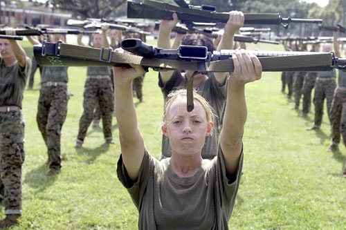 
                    Female Marine Corps recruit Kylieanne Fortin undergoes close combat training in 2004 in Parris Island, S.C.
                                            (Scott Olson / Getty Images)
                                        