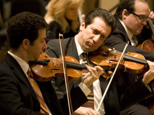 Saint Paul Chamber Orchestra concertmaster Steven Copes, associate concertmaster Ruggero Allifranchini and principal cello Ronald Thomas.