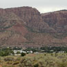 Mountains rise behind Colorado City, Ariz.