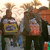 Palestinians from Gaza with goods bought in Egypt 