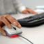 A person clicks on a computer mouse