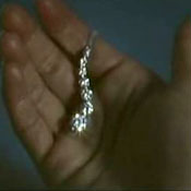 Journey Diamond's s-shaped pendant 