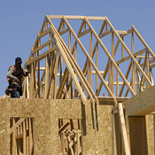 A construction worker builds a new home 