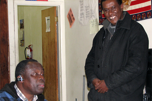 
                    James Kilat (left) is from Uganda and Julius Kimeni Nganga is Kenyan. The two men are now U.S. citizens and getting ready to vote in their first U.S. election.
                                            (Mhari Saito)
                                        