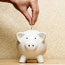 Saving in a piggy bank