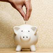Saving in a piggy bank 