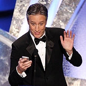 Oscars host Jon Stewart with iPhone 