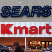 A Sears sign and a Kmart sign 