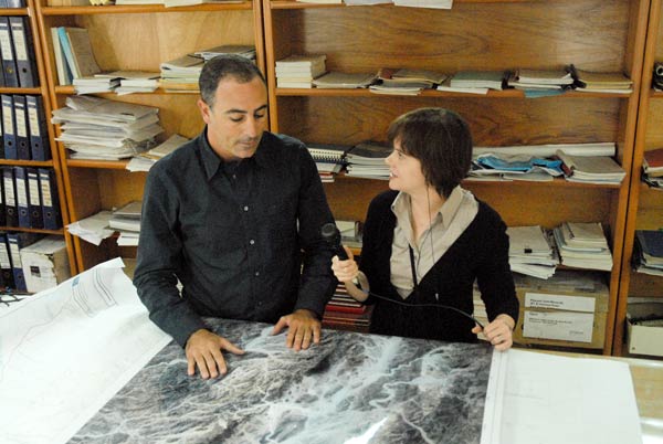 
                Joseph El-Raghy, CEO of Centamin Egypt, shows Marketplace's Amy Scott a map of the Red Sea hills area where gold mining is planned.
                                    (Alexander Heilner)
                                