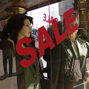 Sale sign in a window of a Cairo clothing store 