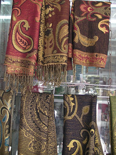 
                Scarves made in India hang in the Ramses Hilton Mall in downtown Cairo.
                                    (Miguel Macias)
                                