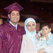 Ahsan Ahmad with his wife and daughter 