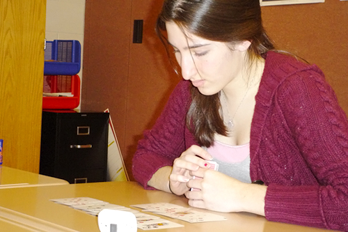 
                    Jenny Frielle memorizes a deck of cards.
                                            (Dan Tredinnick)
                                        