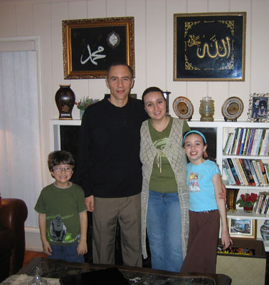 
                The Zerroug family, from left to right: Youssef, Mourad, Amina, and Hanaa, in the living room of their Pasadena home, which they bought with a Muslim mortgage.
                                    (Tess Vigeland)
                                