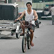 Jose Garcia rides home on his bike. 