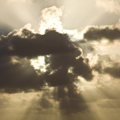 Sun showing through clearing storm clouds 