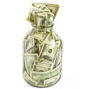 Money in a glass carafe 
