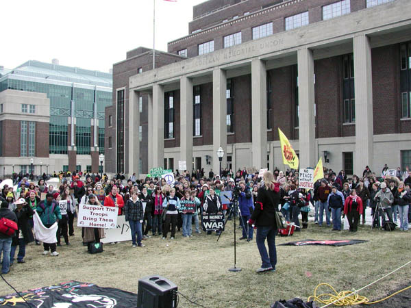 Photo: #A crowd gathers in front of Coffman Memorial Union.